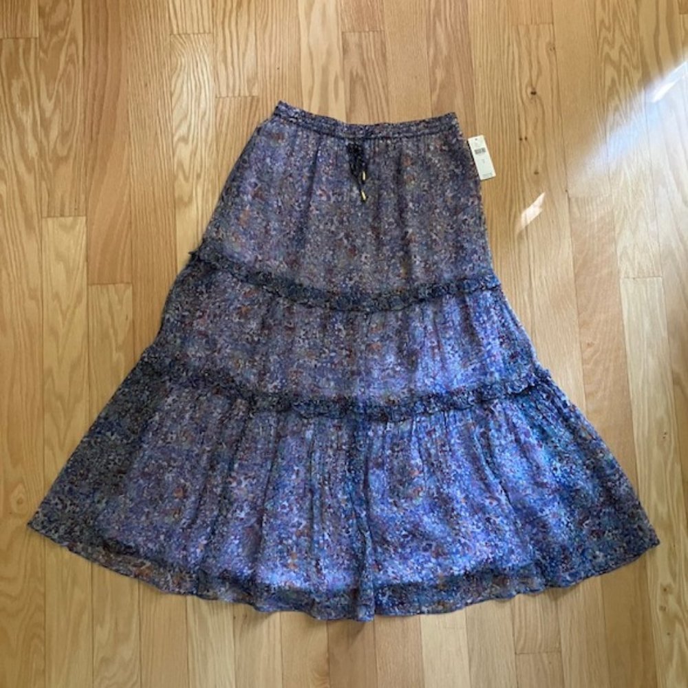 Anthropologie lavender skirt with multi colored flowers in size 2